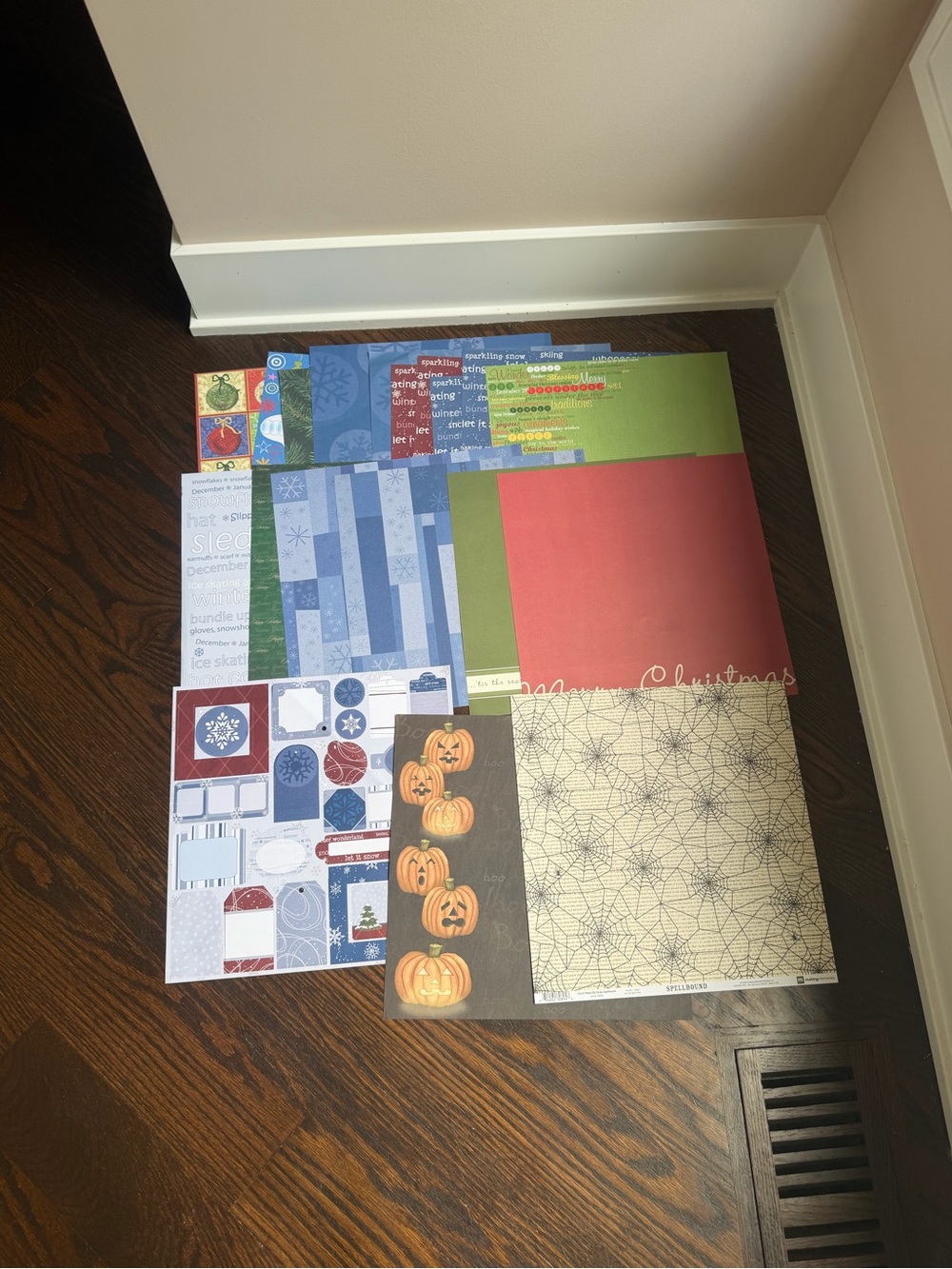 An assortment of 14 different 12x12 holiday themed scrapbooking paper sheets